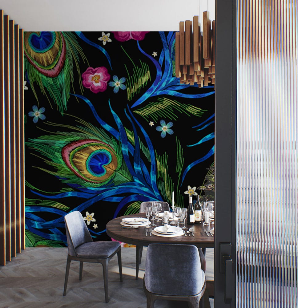 Dining room with Vibrant Peacock Feather Wallpaper, round table, grey chairs, and wooden accents decor.