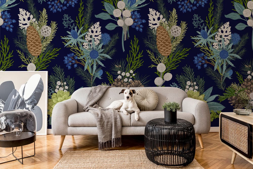 Winter Botanical Pinecone wallpaper in midnight blue with grey sofa, dog, black woven table, rug.