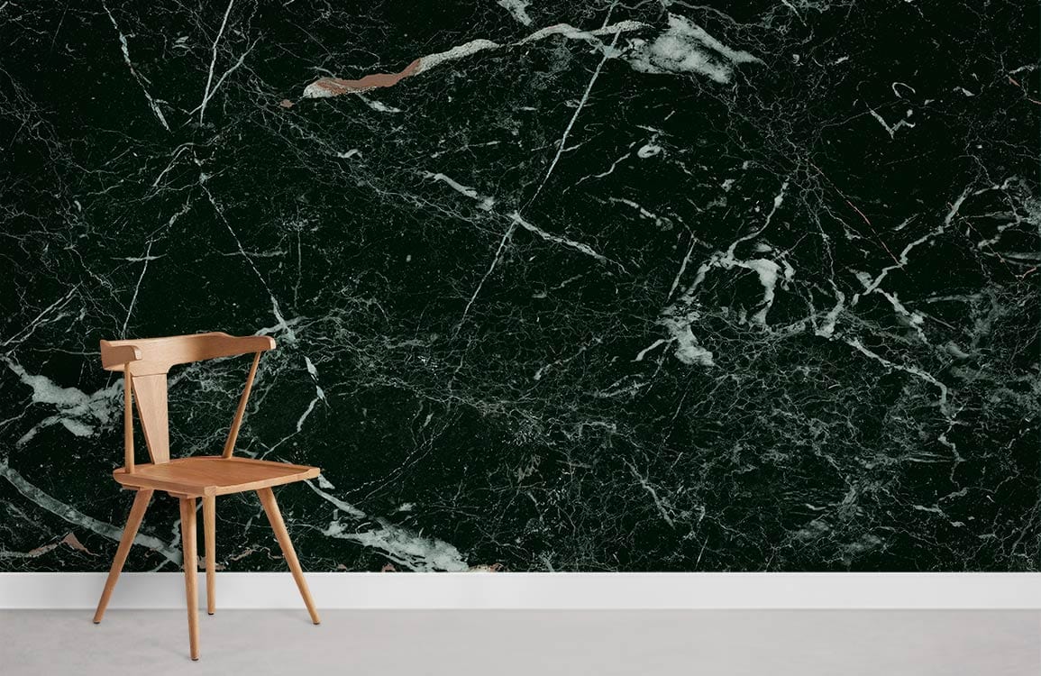 Luxurious black marble effect wallpaper with white veining, wooden chair, minimalist interior style.
