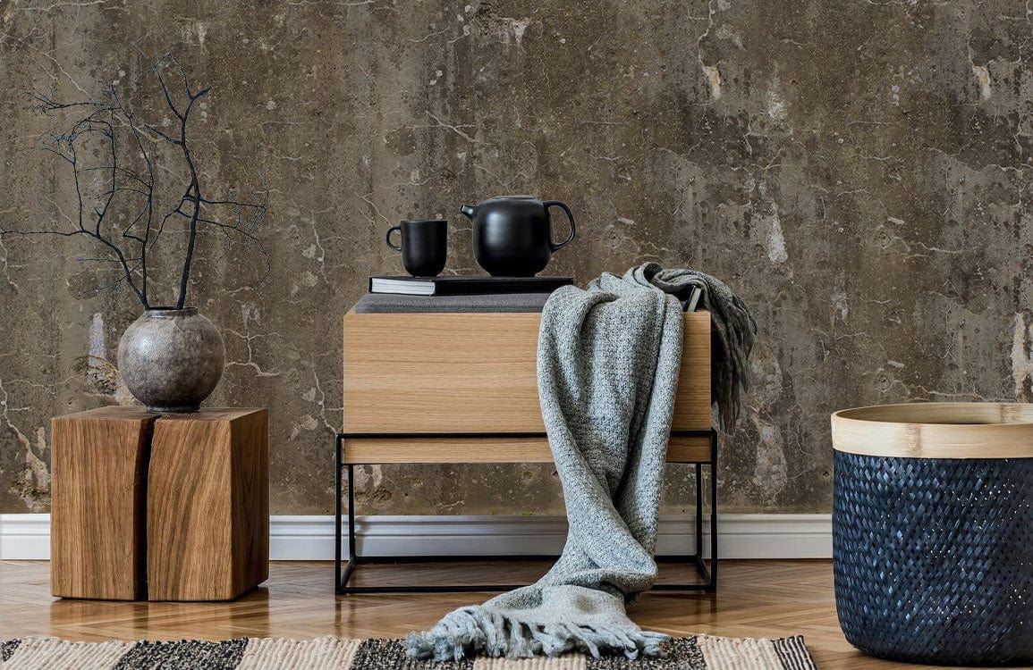 Vintage concrete wallpaper in earthy tones behind modern furniture, wooden flooring, minimalist decor.