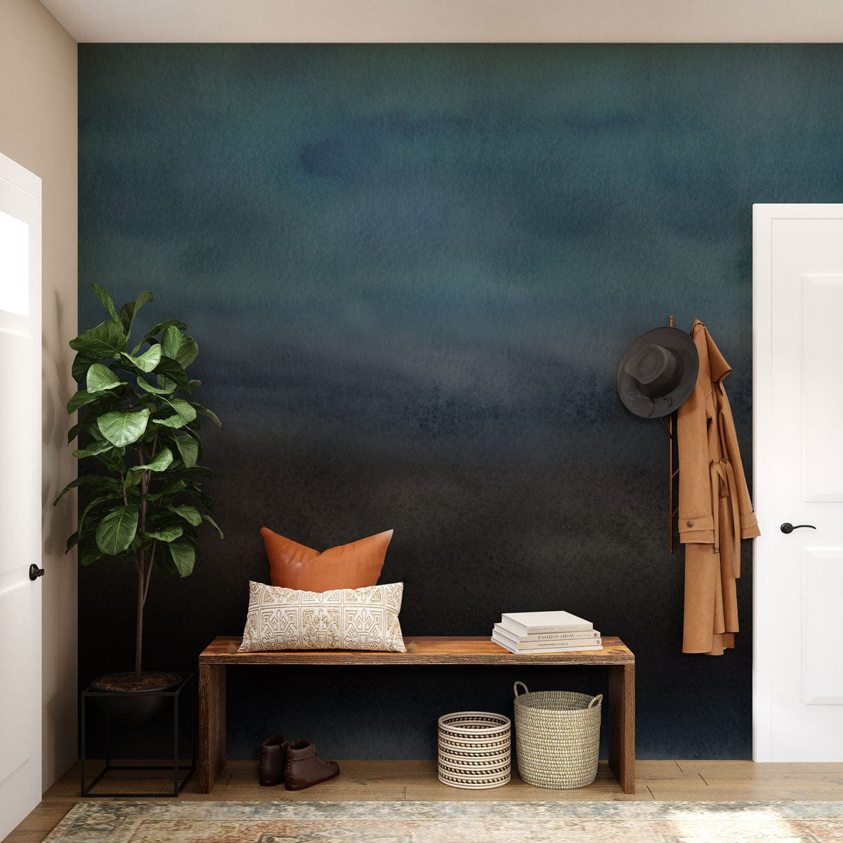 Moody Ocean Mist watercolour mural wallpaper, blue-grey tones; hallway bench, plant, and coat-hanging decor.