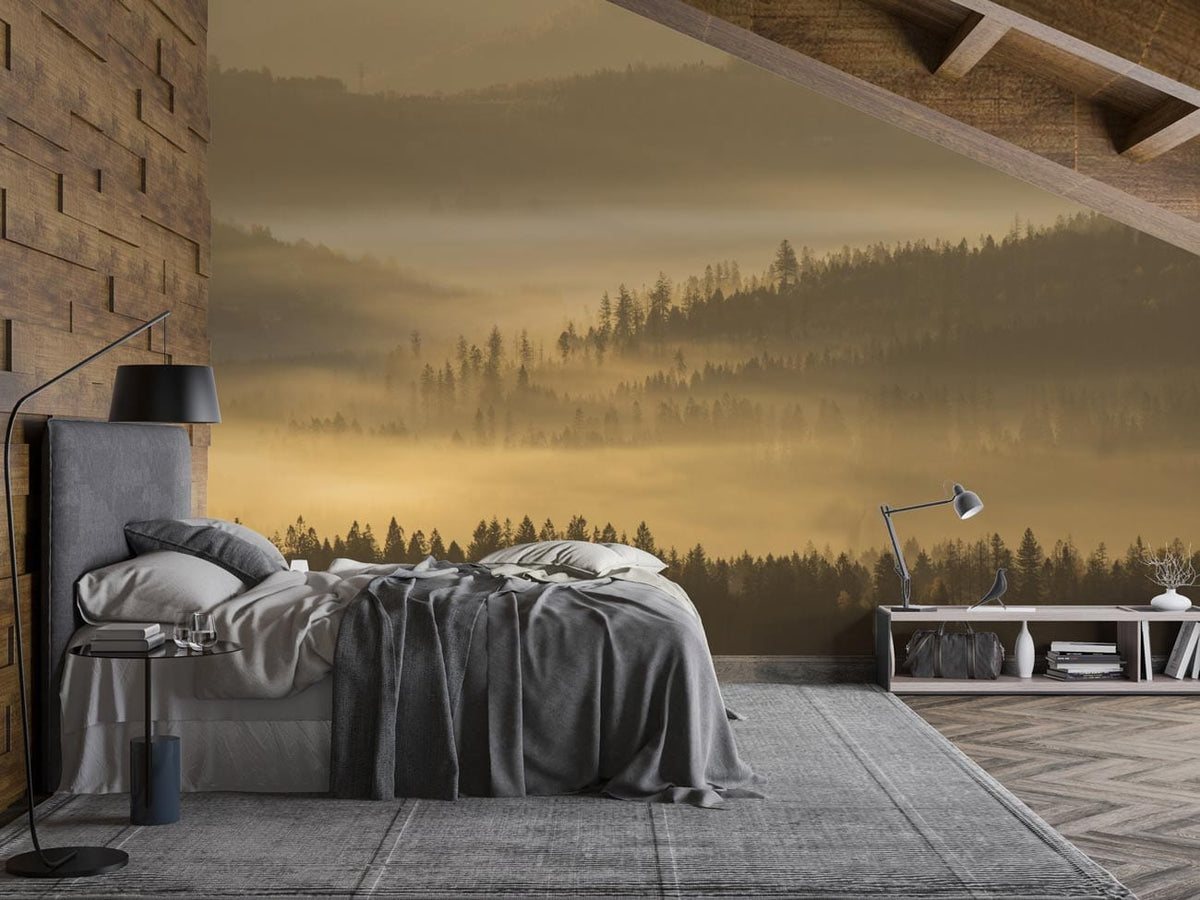 Golden Misty Morning Forest Mural; cosy bedroom, wooden accents, grey bed, modern lamp, chevron flooring.