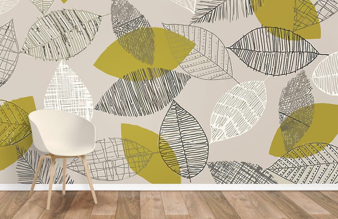 Modern living room with beige chair, Autumnal Leaf Pattern wallpaper, wooden flooring, beige and green decor.