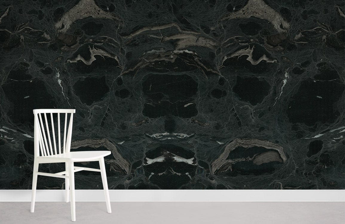 Elegant dark marble wallpaper in sophisticated modern interior, with white chair and light grey flooring.