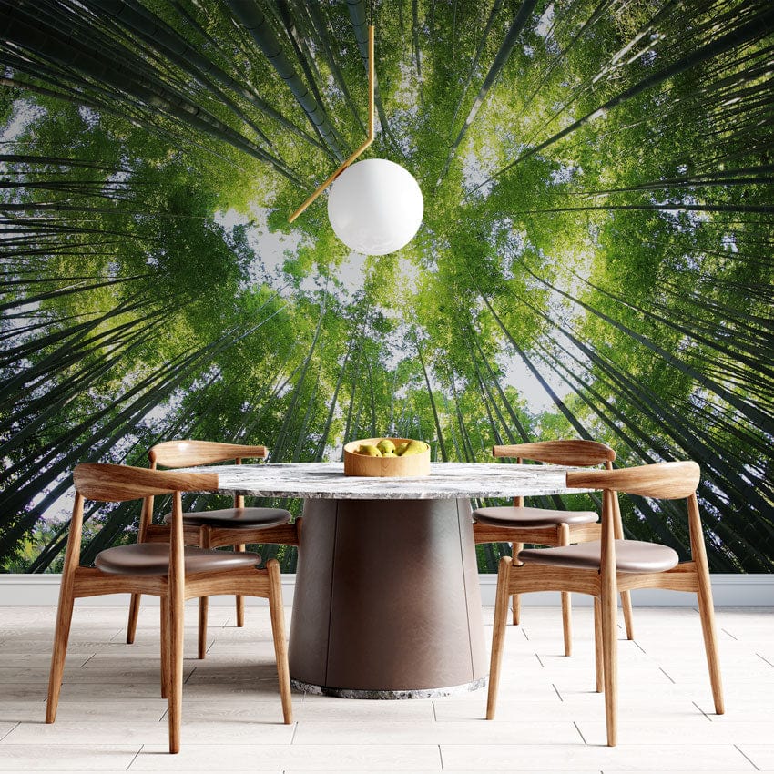 Dining room with wood chairs, marble table, forest mural wallpaper; tranquillity for interiors, serene design.