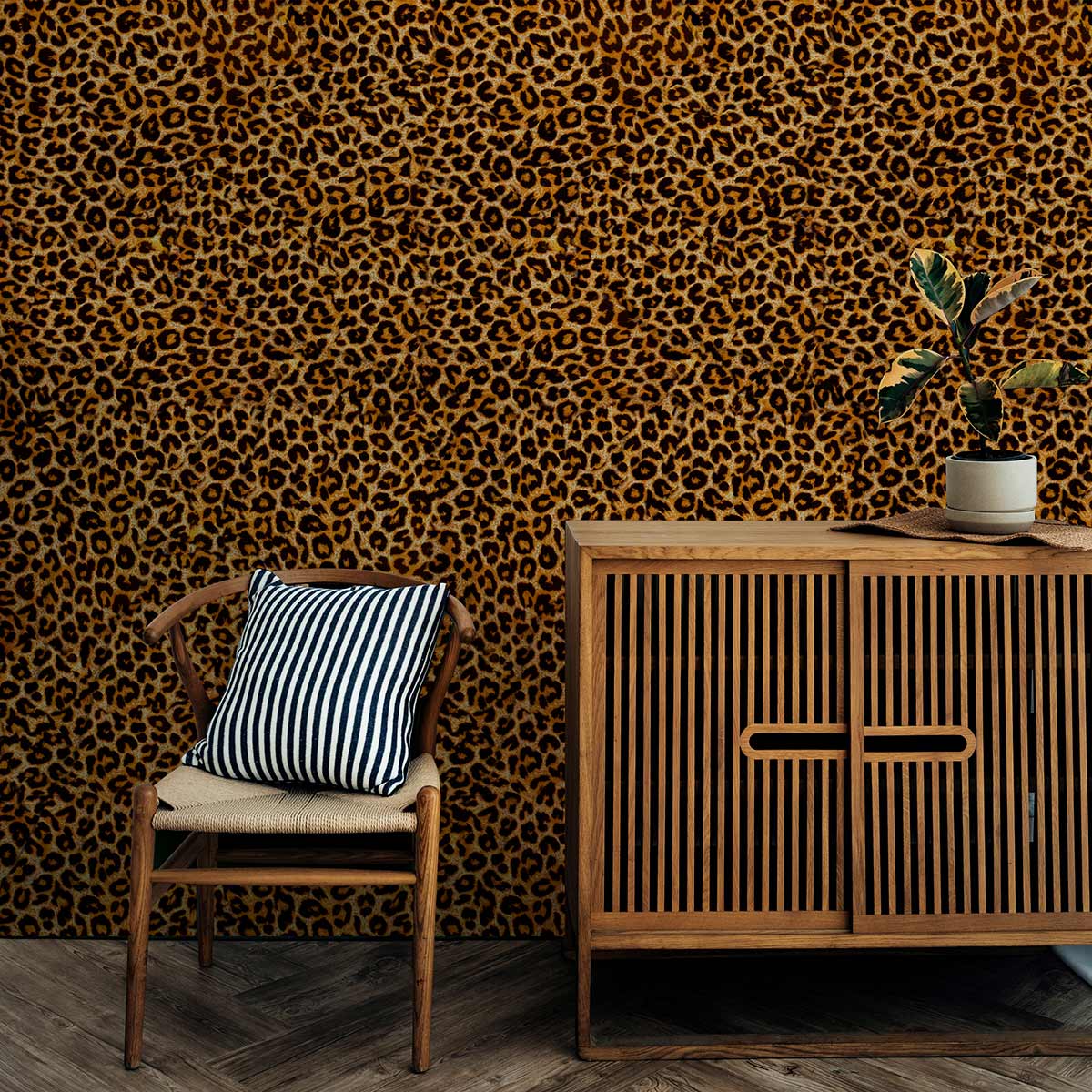 Exotic Leopard Print Wallcovering with wooden cabinet, striped cushion chair, and dark wood flooring.