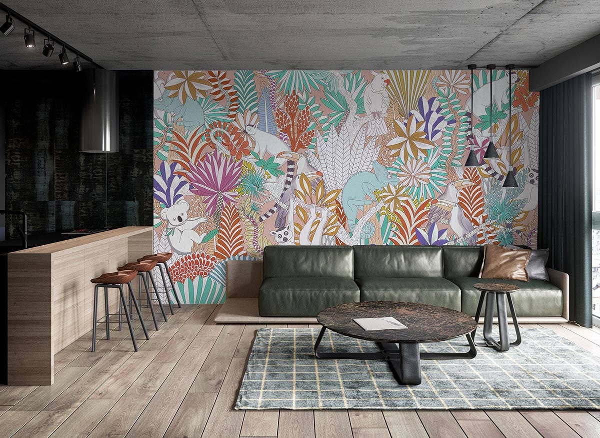 Colourful mural wallpaper with tropical animals, features green leather sofa, wooden flooring, modern kitchen stools.