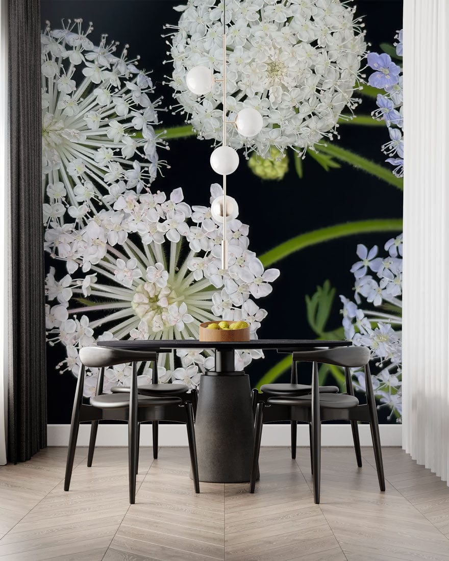 Elegant white and lavender flower mural wallpaper, modern dining room, sleek black table, wood flooring.