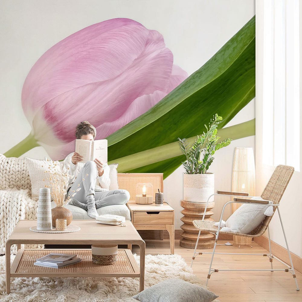 Pink tulip mural wallpaper in cosy living room with Nordic sofa and wooden accents.
