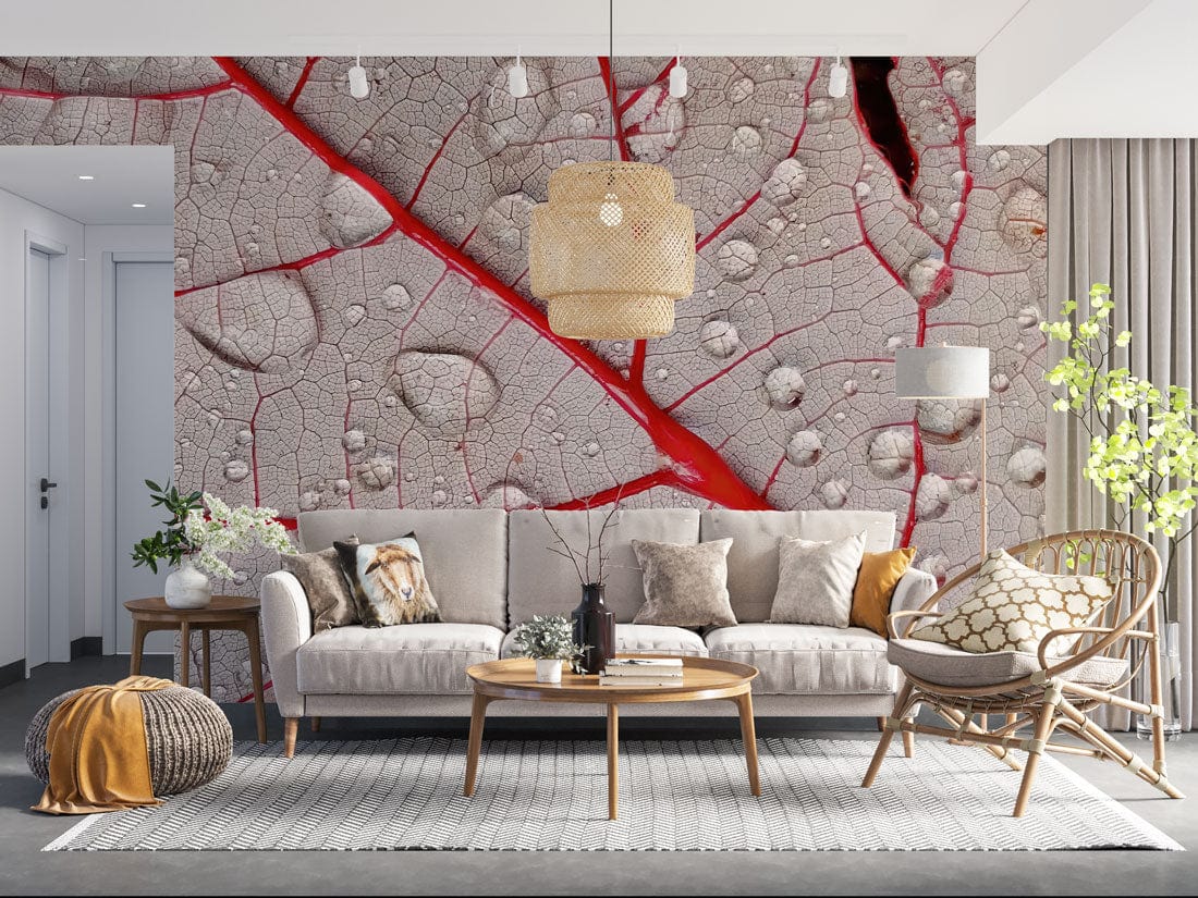 Textured botanical wallpaper by brand; grey sofa, wooden coffee table, rattan chair, modern living room.