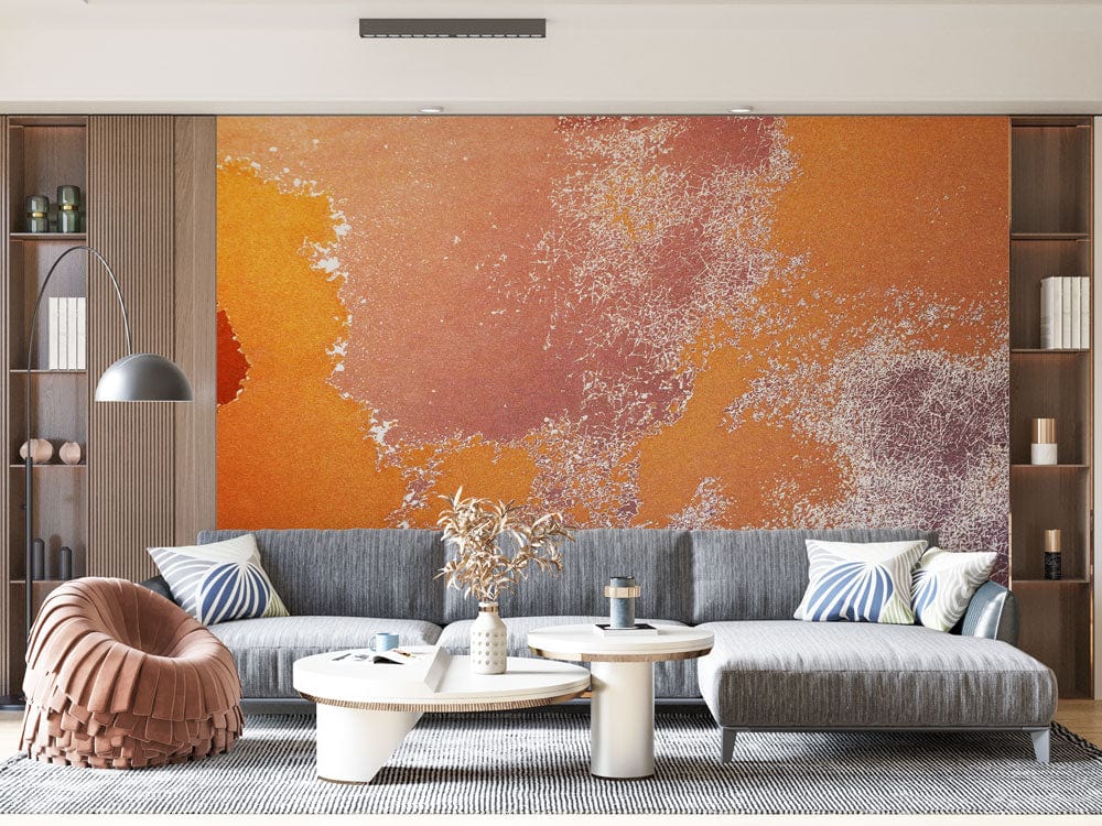 Rustic earth tone mural wallpaper with metallic accents in modern living room; grey sofa, round tables.