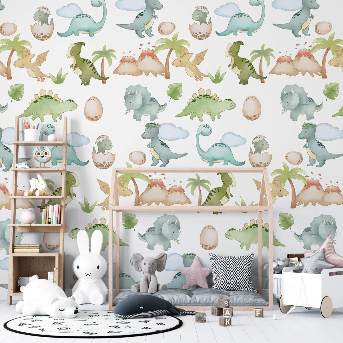 Dinosaur-themed nursery wallpaper with pastel dinosaurs, wooden shelf, soft toys, and light flooring in playroom.