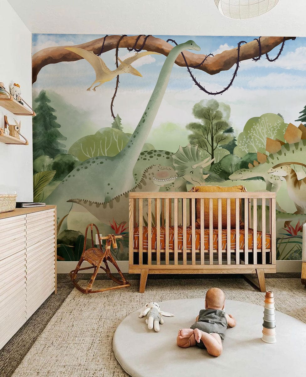 Enchanting Dinosaur Jungle Mural Wallpaper in nursery with wooden crib, patterned rug, neutral shelving units.
