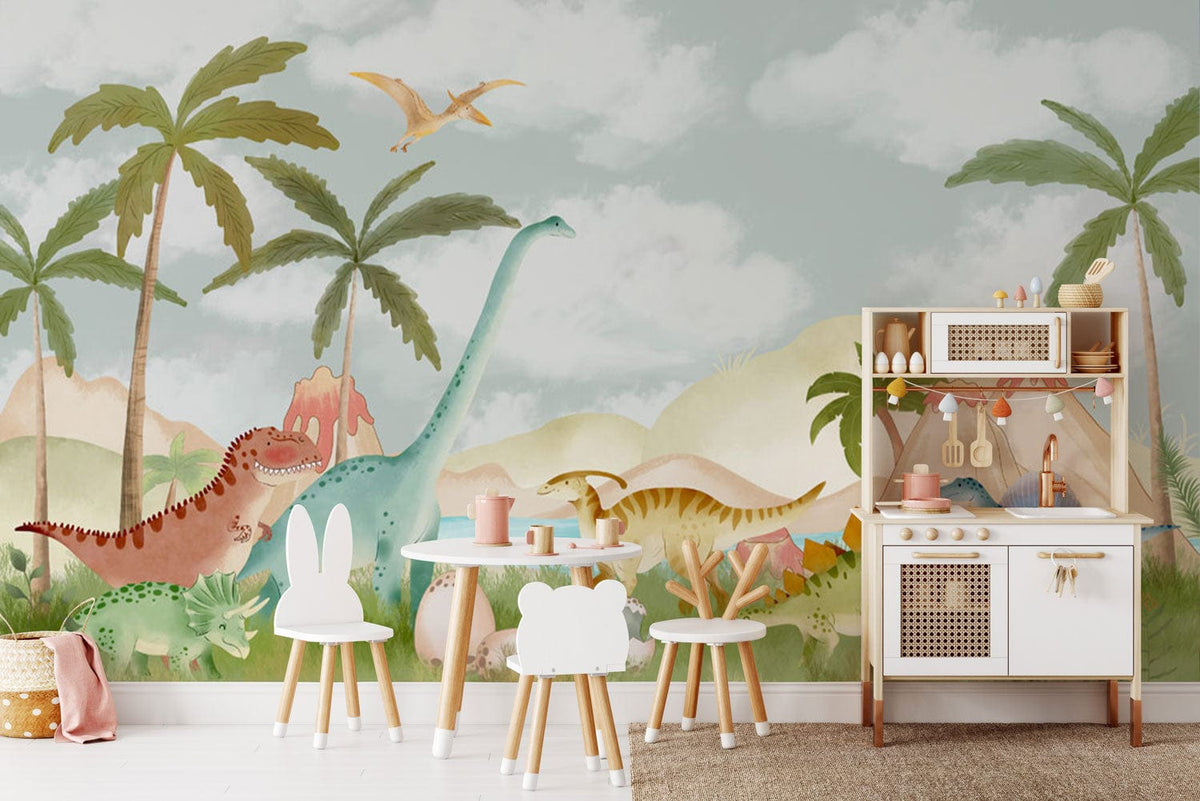 Enchanted Dinosaur Mural Wallpaper in pastel jungle; children's playroom with white furniture and wood flooring.