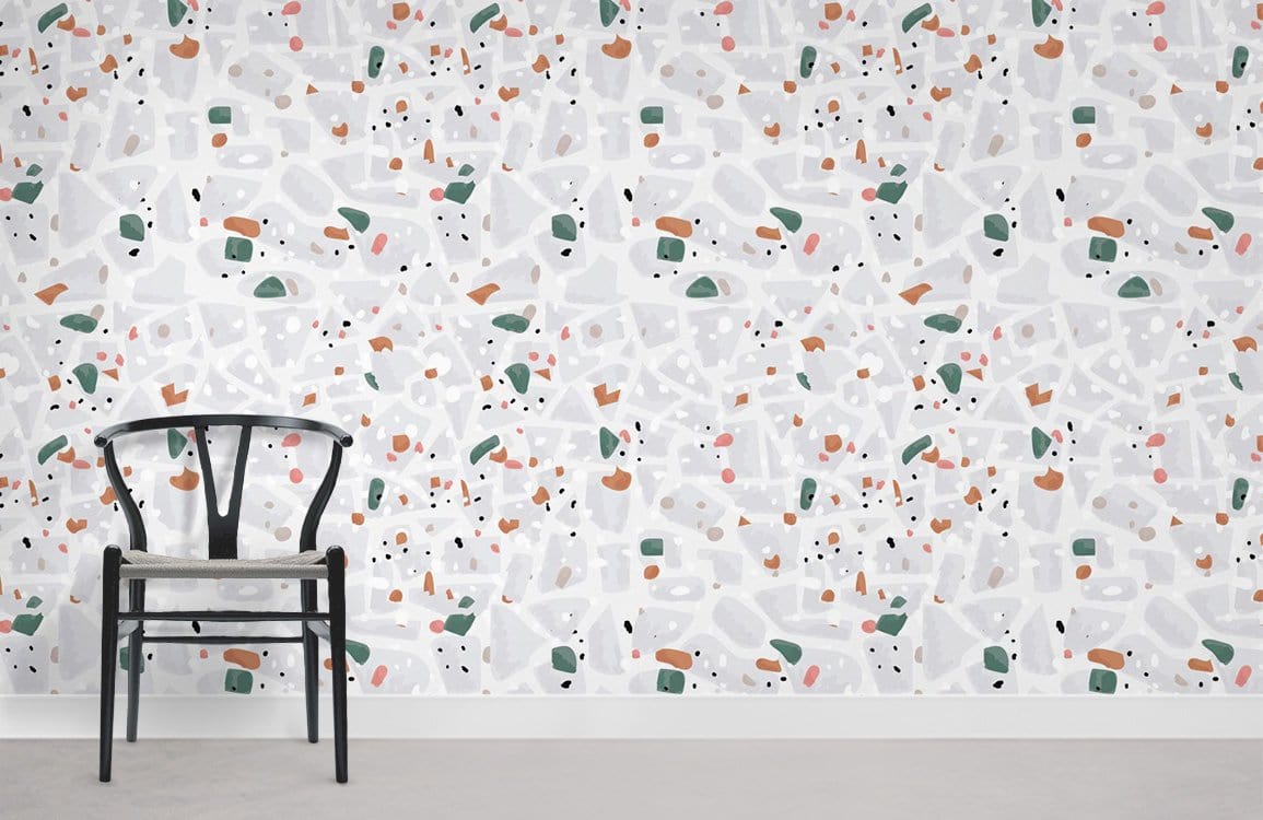 Modern Terrazzo Pattern Wallpaper in earthy tones, featuring sleek chair, complements contemporary interior decor.