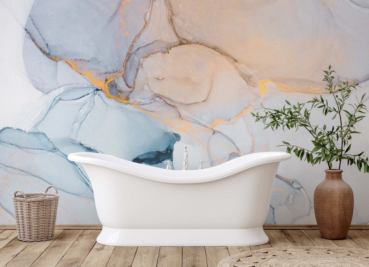 Elegant Marble Swirl mural wallpaper in blue and gold, featuring white bathtub, wooden flooring.