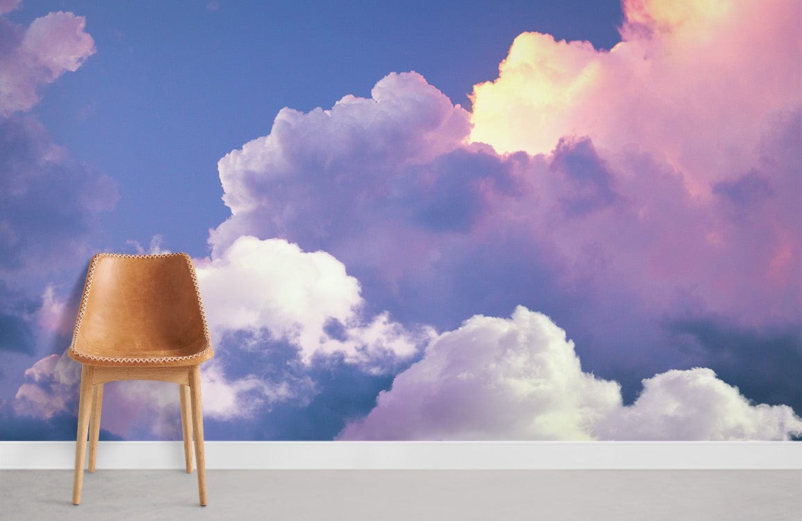 Dreamy Pastel Cloudscape Mural Wallpaper with brown leather chair on grey flooring in modern room.