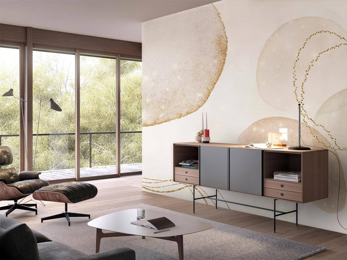 Elegant neutral abstract wallpaper in modern living room with mid-century armchair, wooden flooring, sideboard.