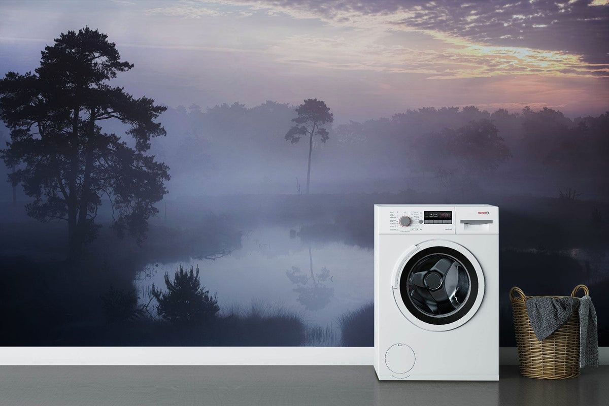 Tranquil Twilight Mist Forest wallpaper, serene blues, purples, laundry room, white washer, grey flooring.