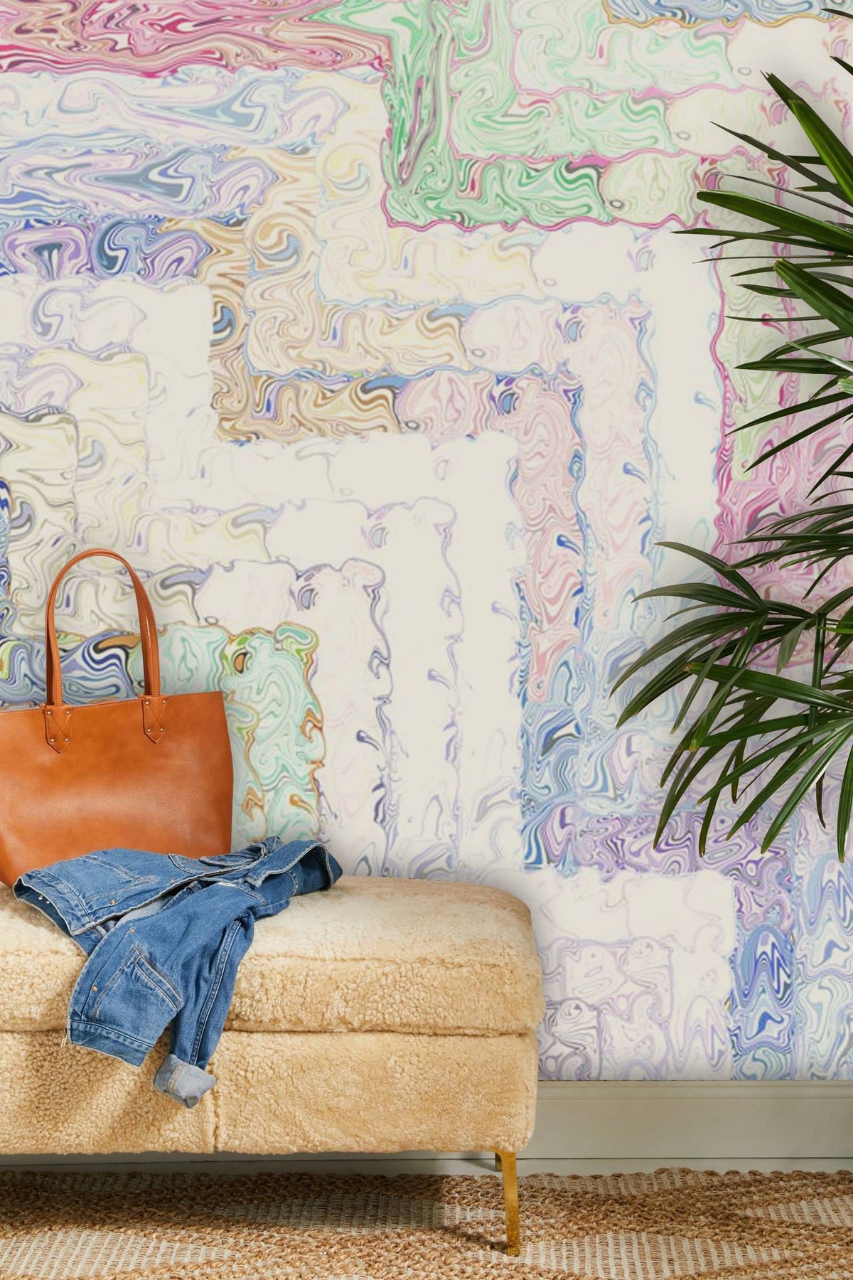 Pastel Swirls Abstract Murals in watercolour style, beige fur bench, green plant, woven rug.