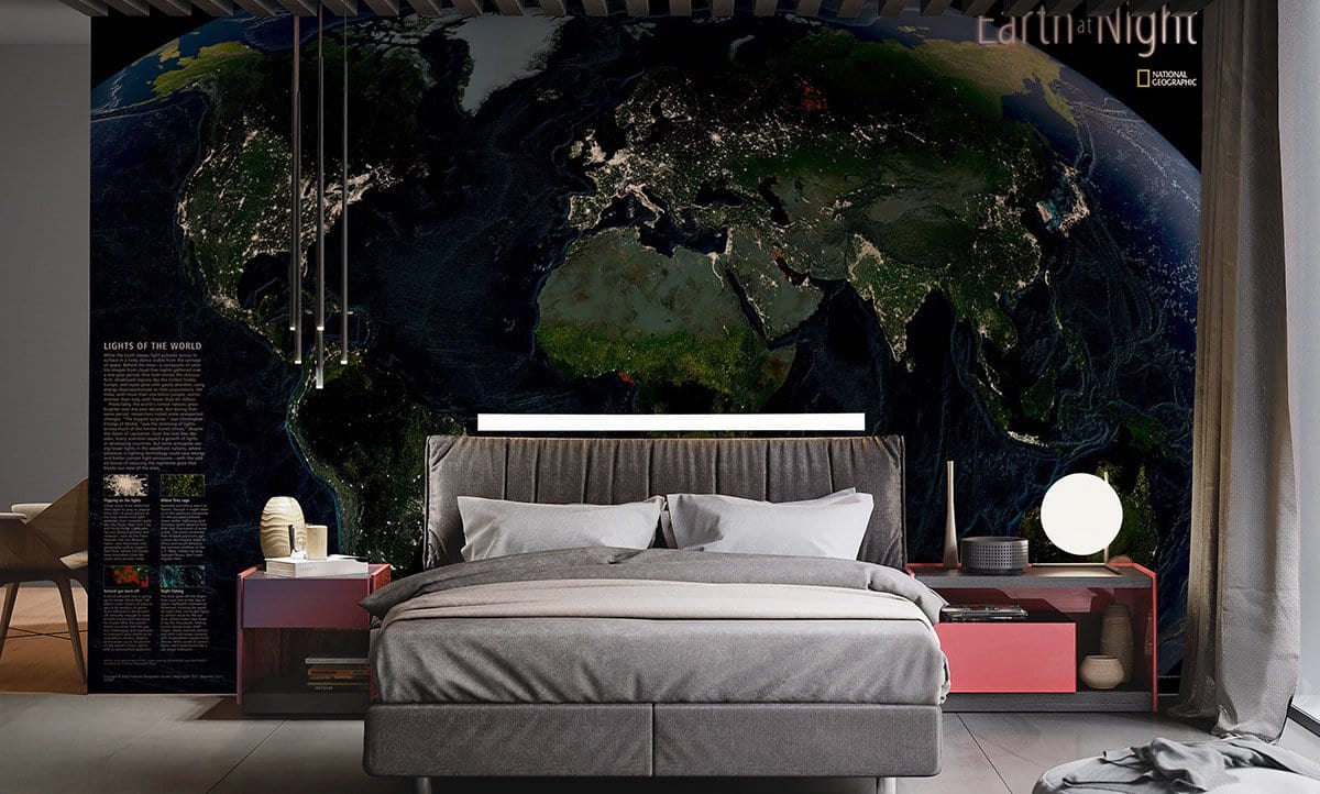 Illuminated Earth map mural by National Geographic, modern bedroom style, grey bed, wood flooring.