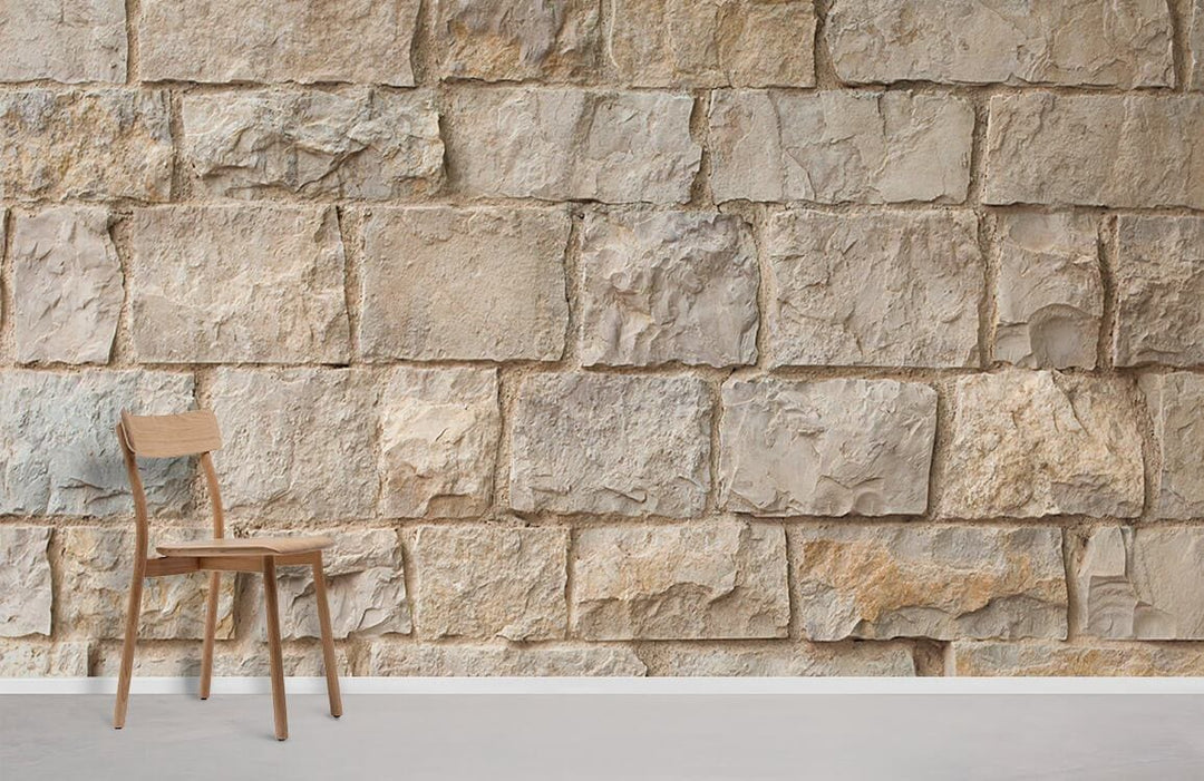 Rustic beige stone wallpaper in living room with wooden chair and grey flooring for vintage charm.