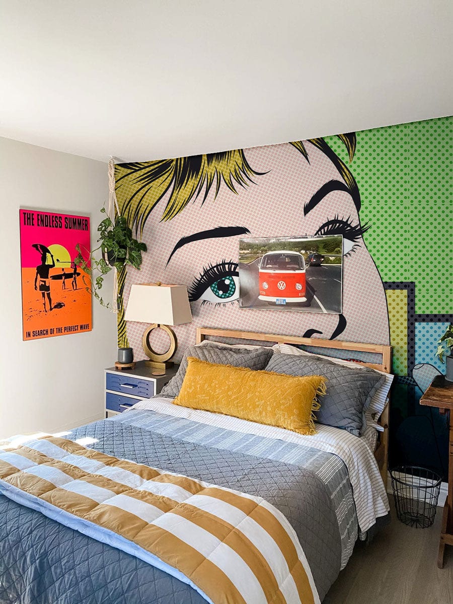Vibrant Pop Art Retro Wall Mural in colourful bedroom with modern design, yellow throw, blue nightstand.
