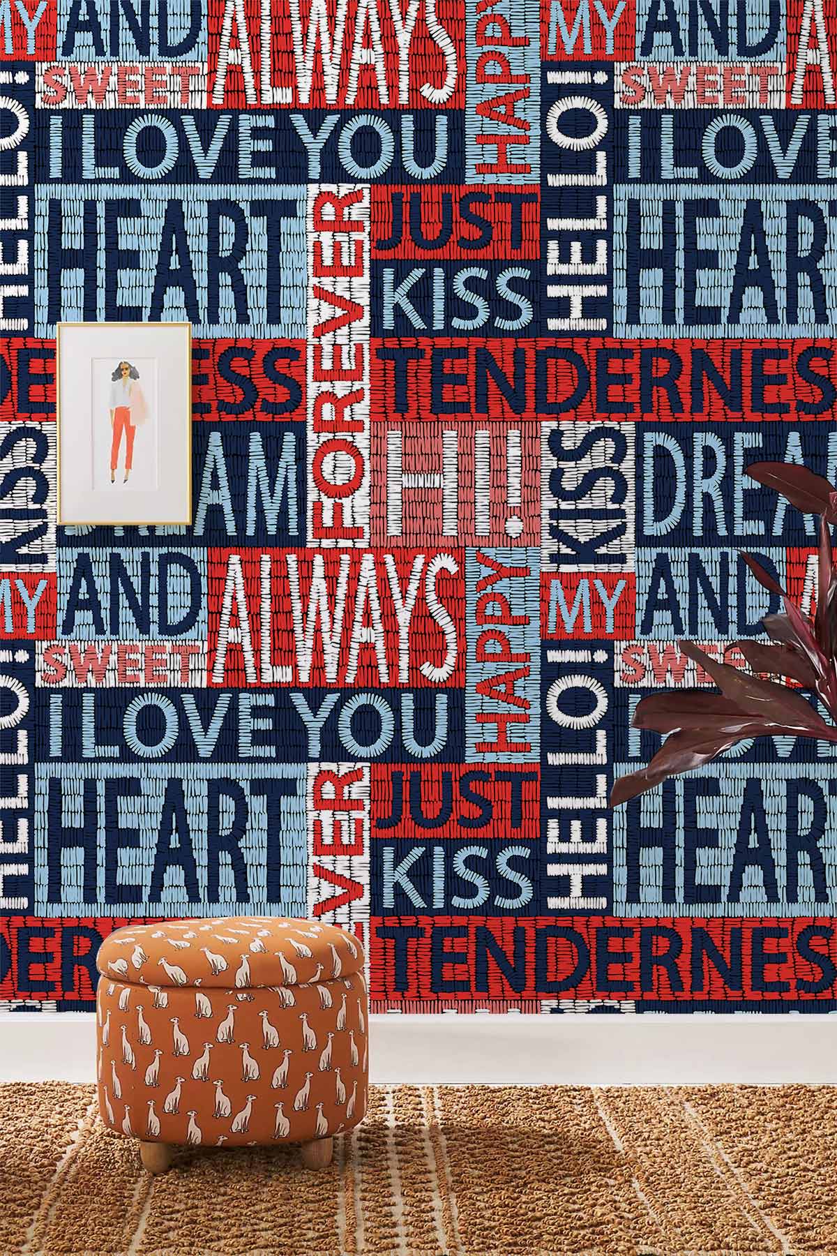 Romantic Typography Wall Mural with orange pouffe, textured flooring, decorative plant, modern living room.