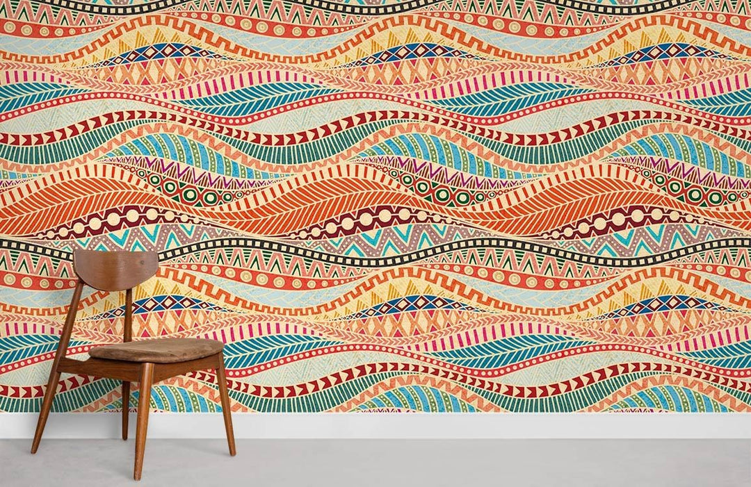 Vibrant Tribal Bohemian multicolour wallpaper with wooden chair on grey flooring in a stylish room.