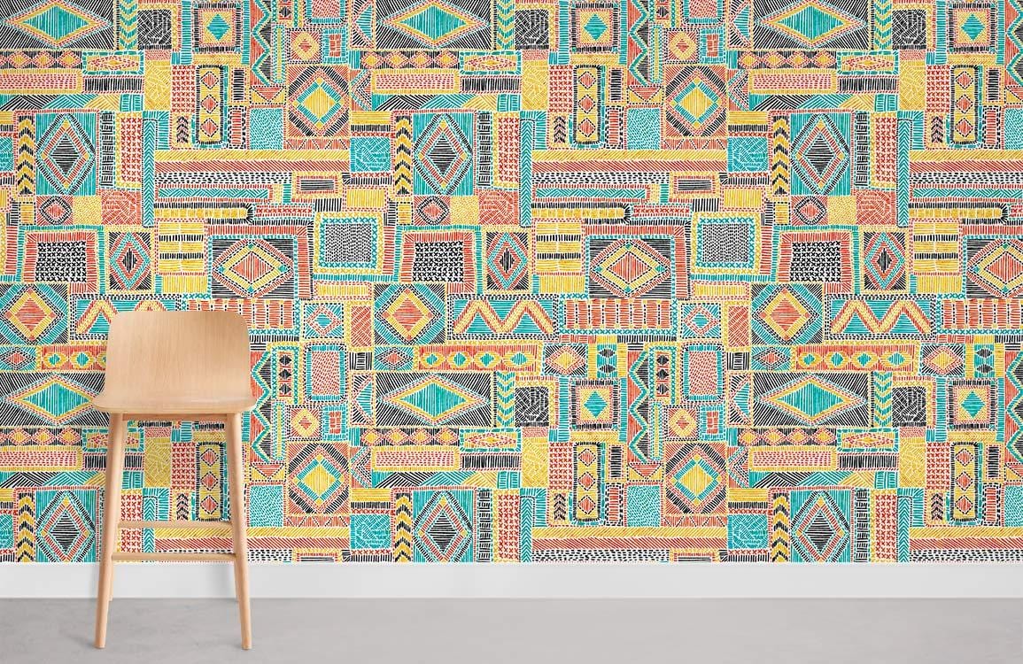 Bohemian Geometric Patterned Wallpaper, vibrant pastel ethnic design, wooden chair, concrete flooring, colourful room.
