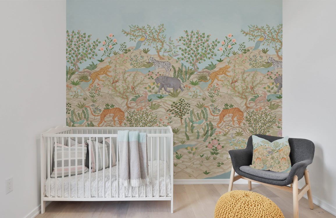 Nursery with Exotic Jungle Safari Mural Wallpaper, pastel tones, grey chair, white crib, wooden flooring.