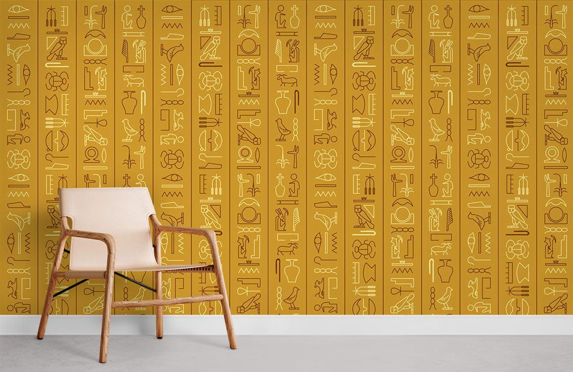 Ancient Egyptian gold hieroglyphics mural wallpaper with beige chair, grey flooring in stylish room.