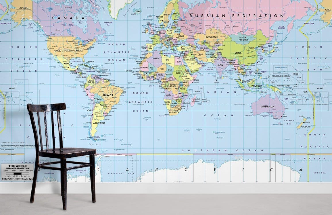 Vintage World Map Mural Wallpaper in pastel tones, featuring black chair and neutral flooring in room.
