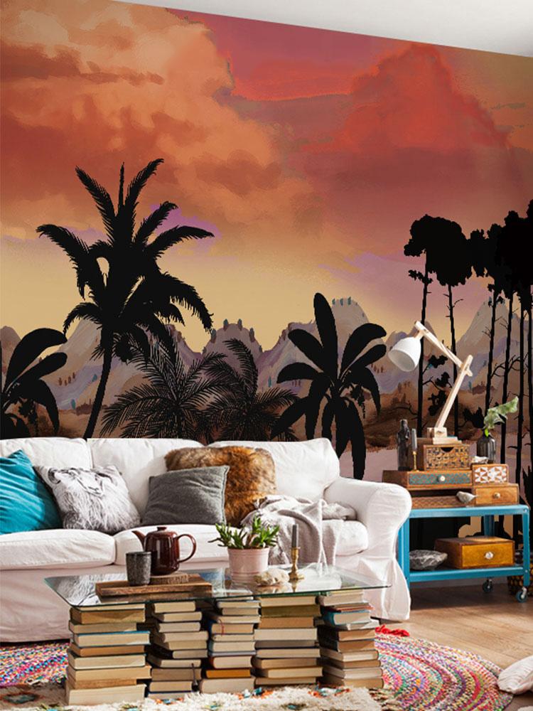 Tropical wallpaper in living room; white sofa, colourful rug, wooden flooring, vibrant sunset mural backdrop.