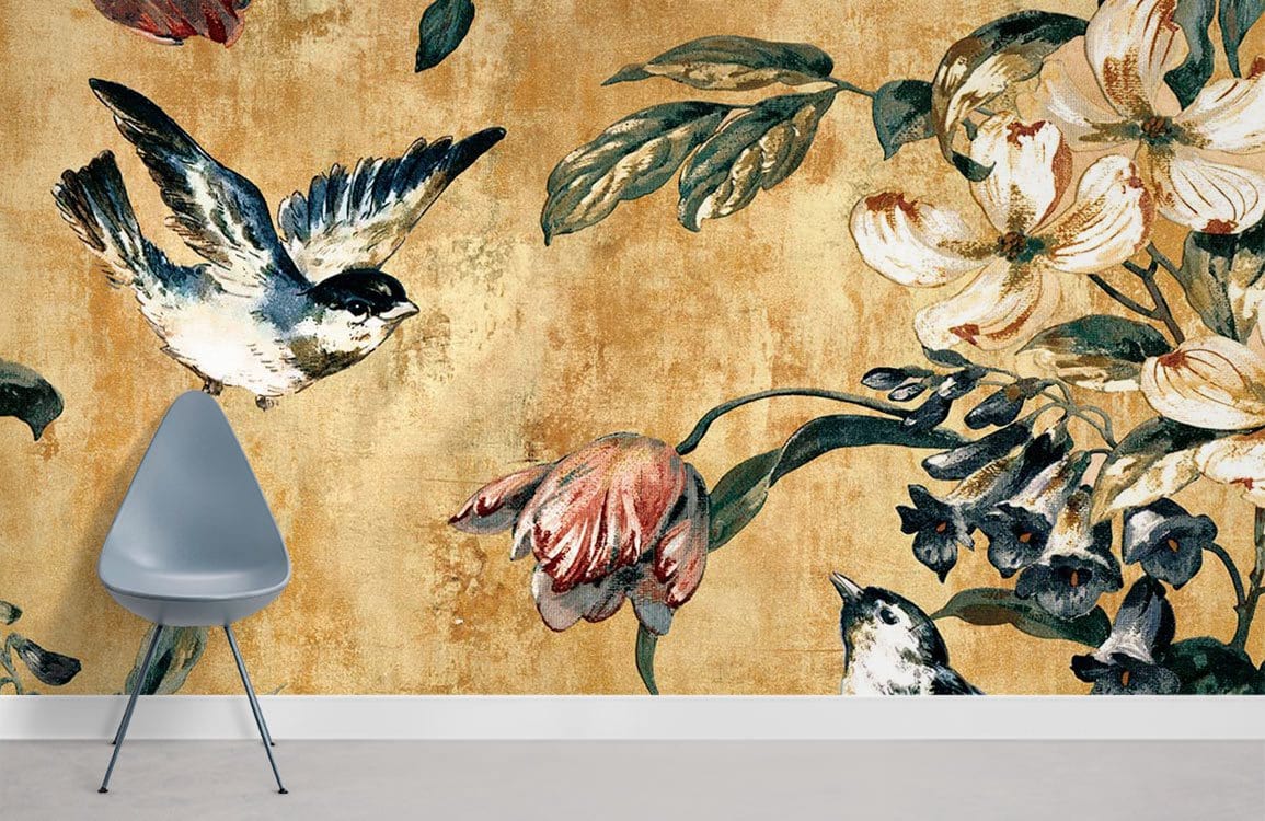 Floral Bird Harmony Vintage Wallpaper in warm tones graces modern room with sleek grey chair.