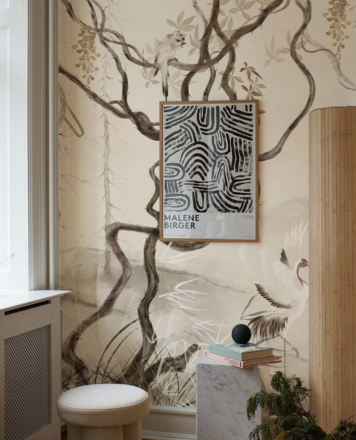 Serene Crane Mural Wallpaper in beige room, with stool and minimalist artwork, sophisticated home decor.