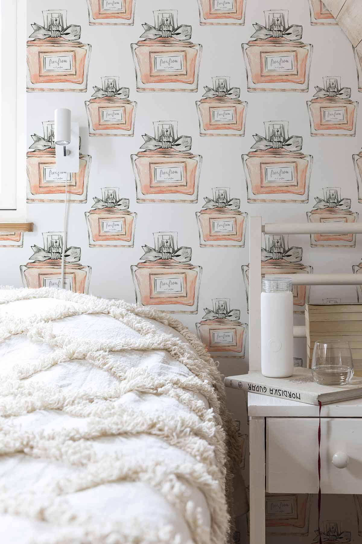 Vintage Perfume Bottle Pattern Wallpaper in bedroom with white bed, bedside table, and pastel decor.