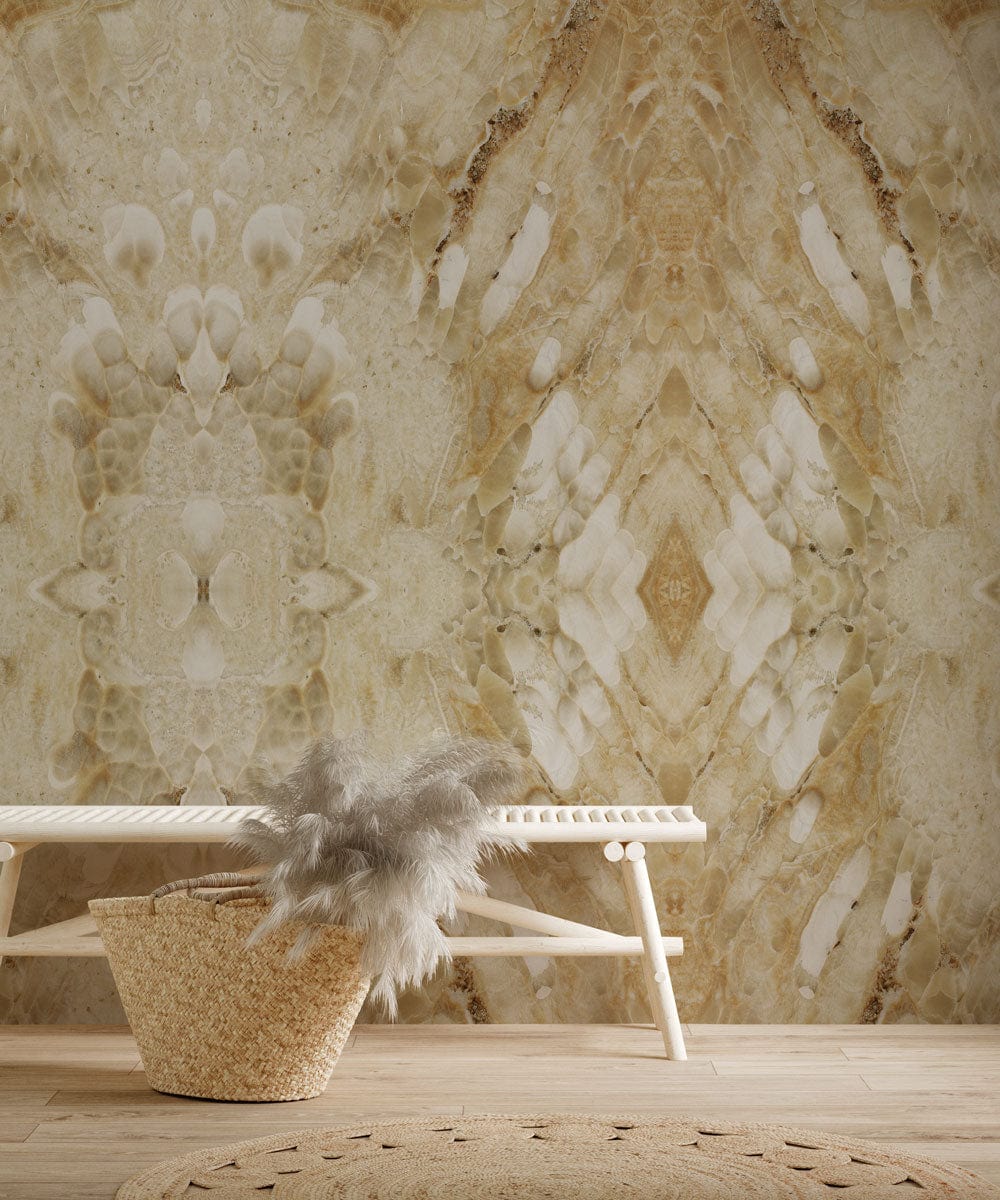 Elegant beige marble textured mural wallpaper with geometric pattern, wooden bench, woven basket, wood flooring.