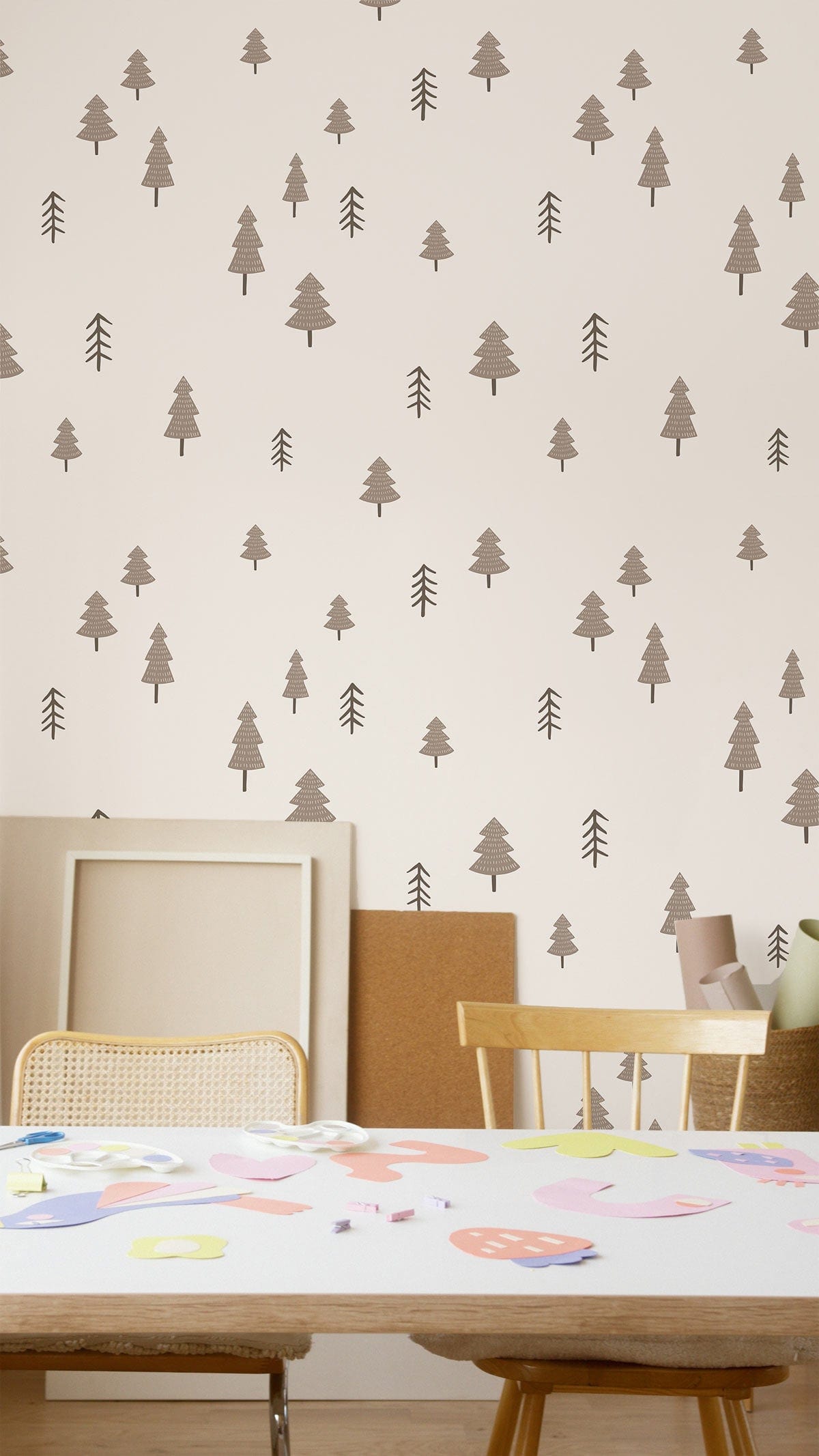 Minimalist Scandinavian wallpaper with beige pine tree pattern in modern dining room featuring wooden chairs.