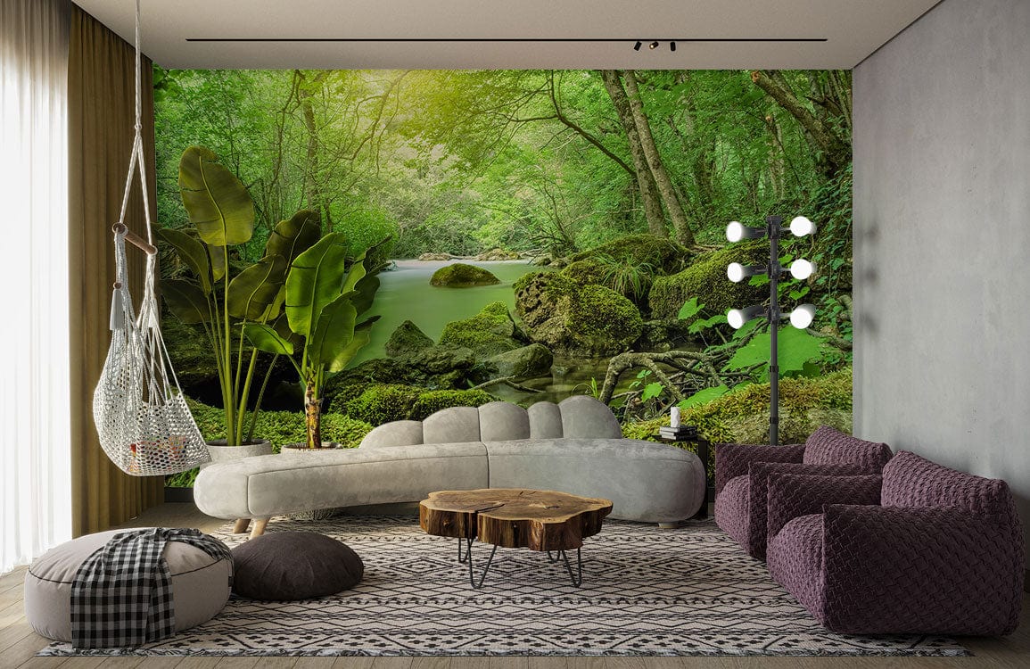 Serene Green Forest Stream mural wallpaper in living room with grey sofa, patterned rug, nature decor.