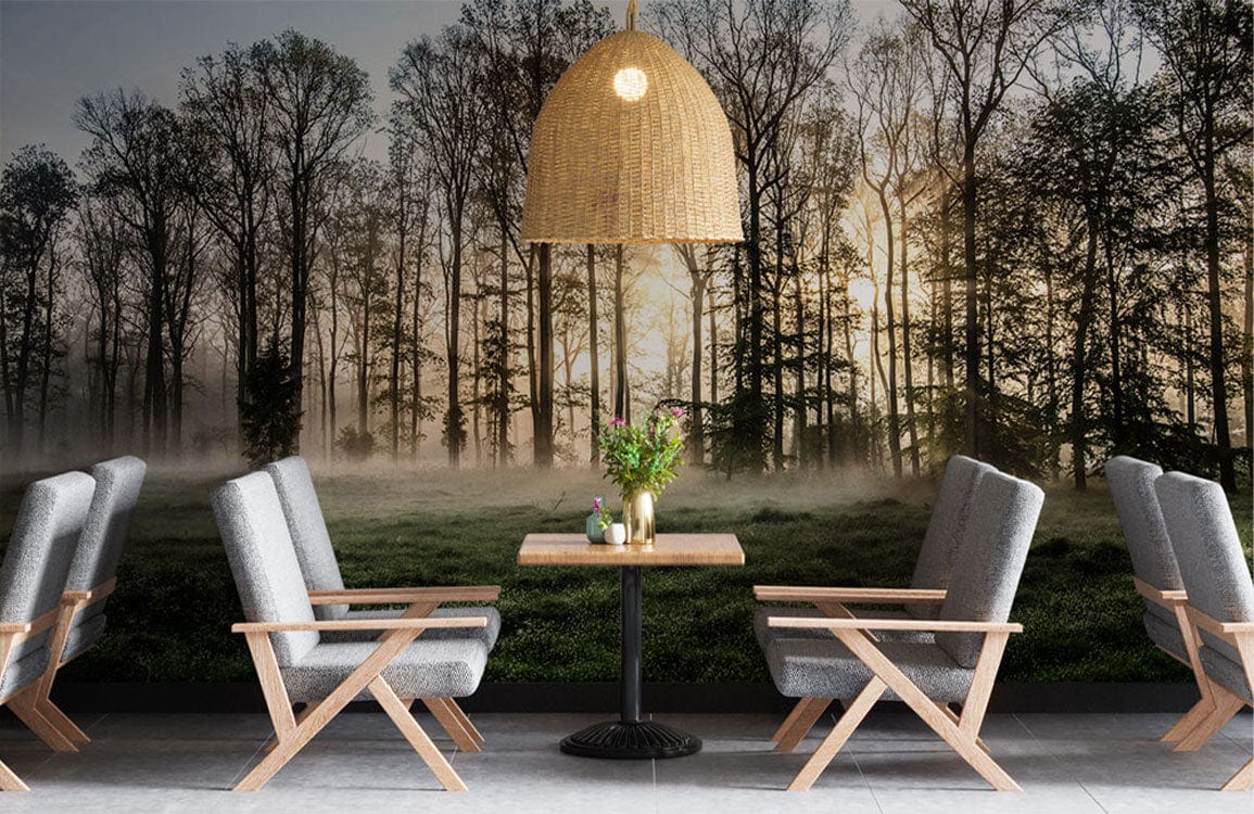 Cosy lounge with Enchanted Woodland Sunrise Mural, grey armchairs, wooden features, serene atmosphere.