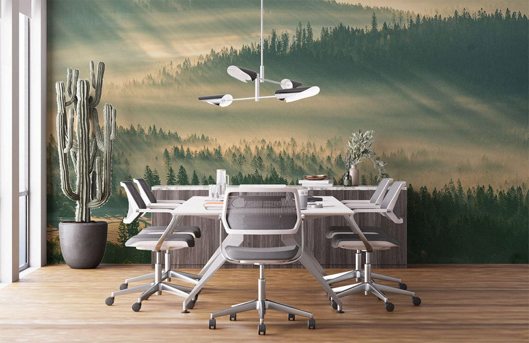 Office with Serene Misty Forest Mural Wallpaper, modern chairs, wooden floor, and pendant lighting fixture.
