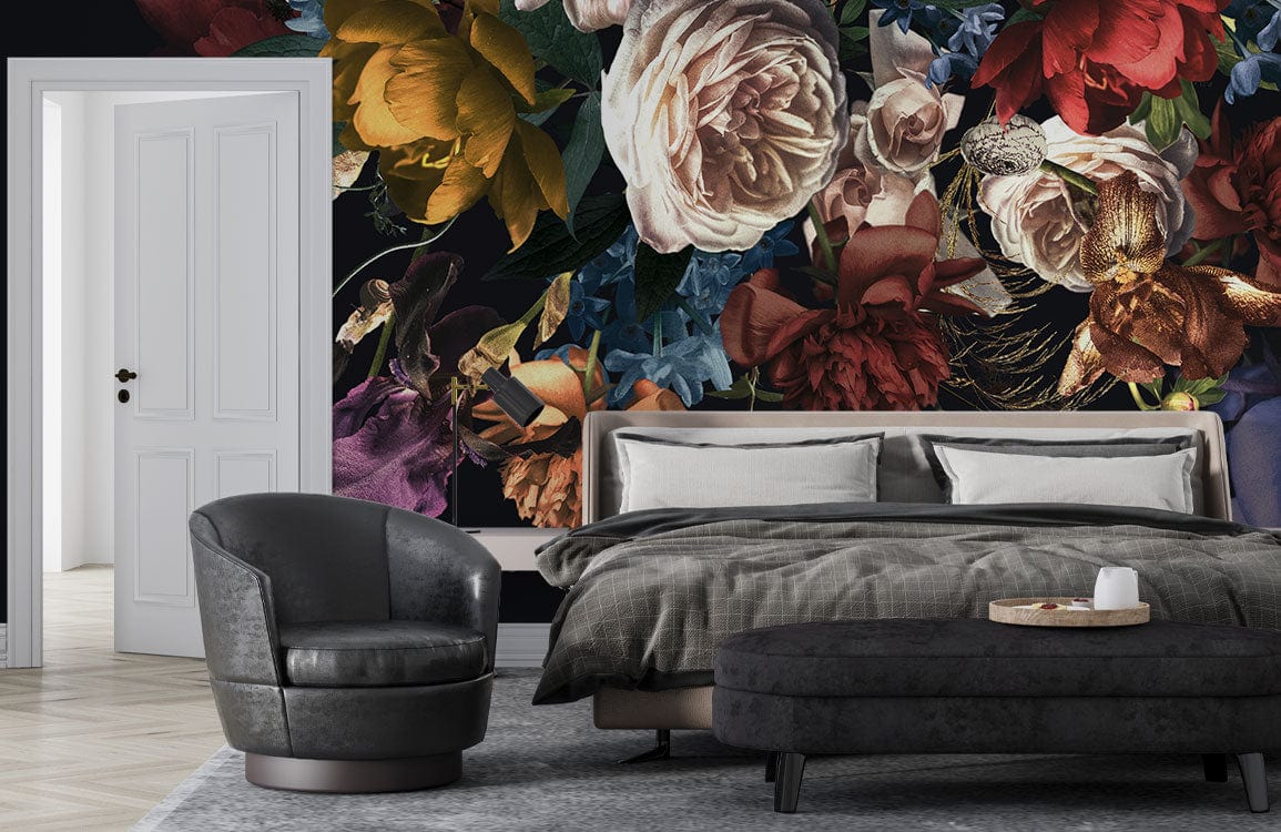 Elegant bedroom with dark floral wallpaper; grey bedding; modern grey armchair; light wooden flooring.