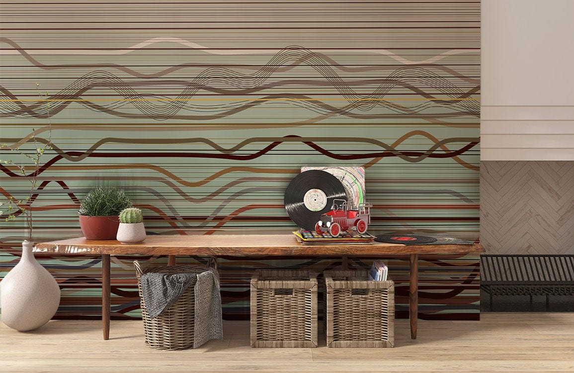 Earthy toned abstract contemporary wallpaper in modern interior with rustic wooden bench and wicker baskets.