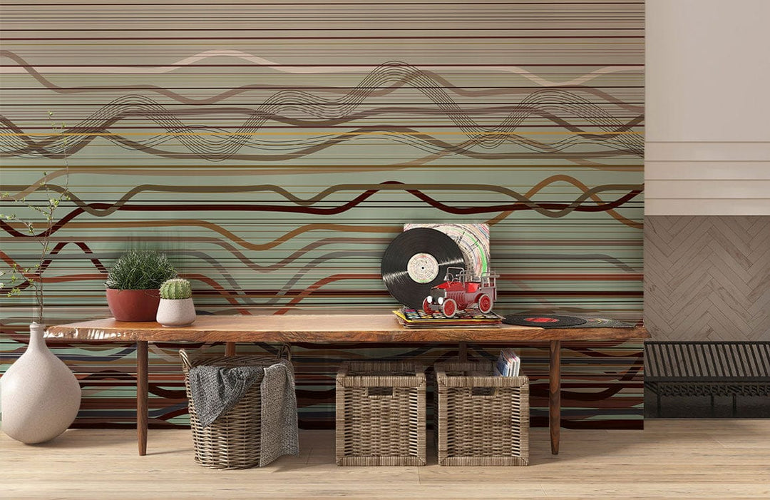 Earthy toned abstract contemporary wallpaper in modern interior with rustic wooden bench and wicker baskets.