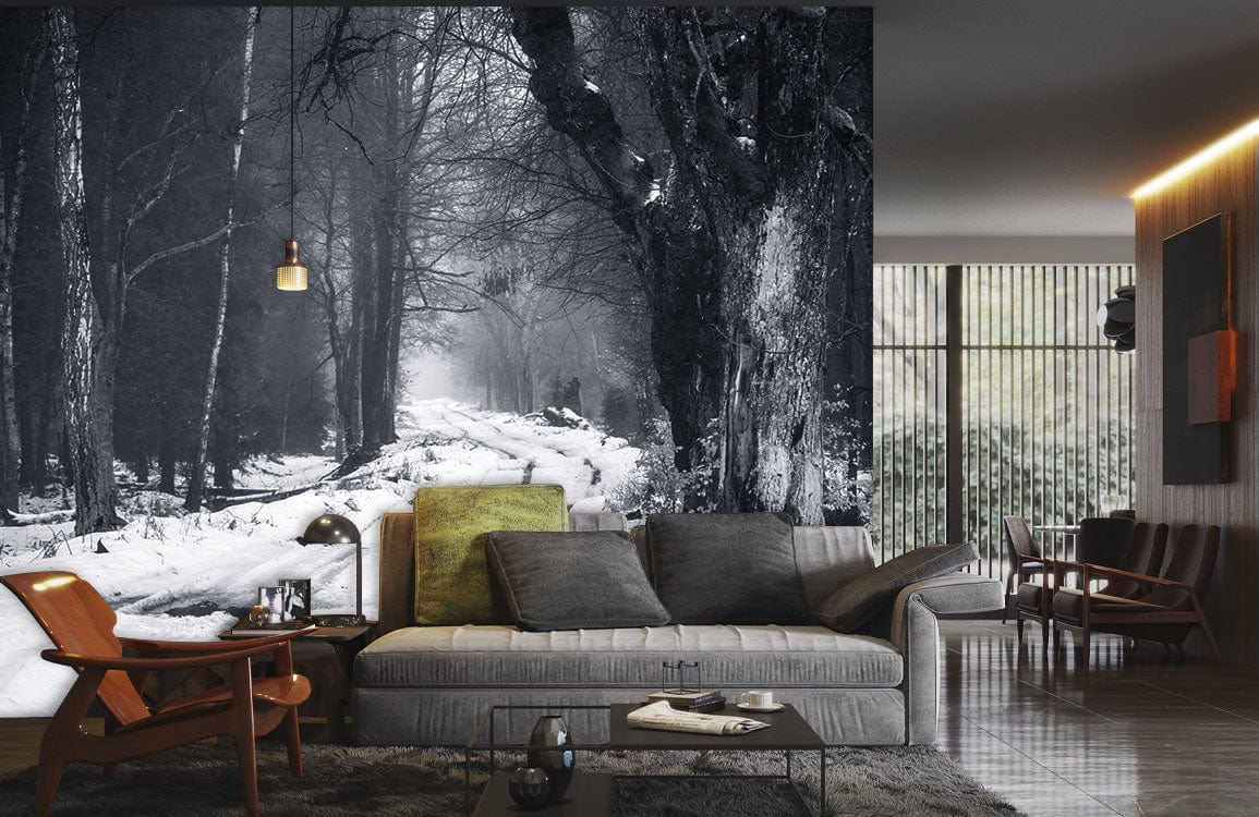 Monochrome forest path mural wallpaper in living room with grey sofa, wooden flooring, and modern decor.