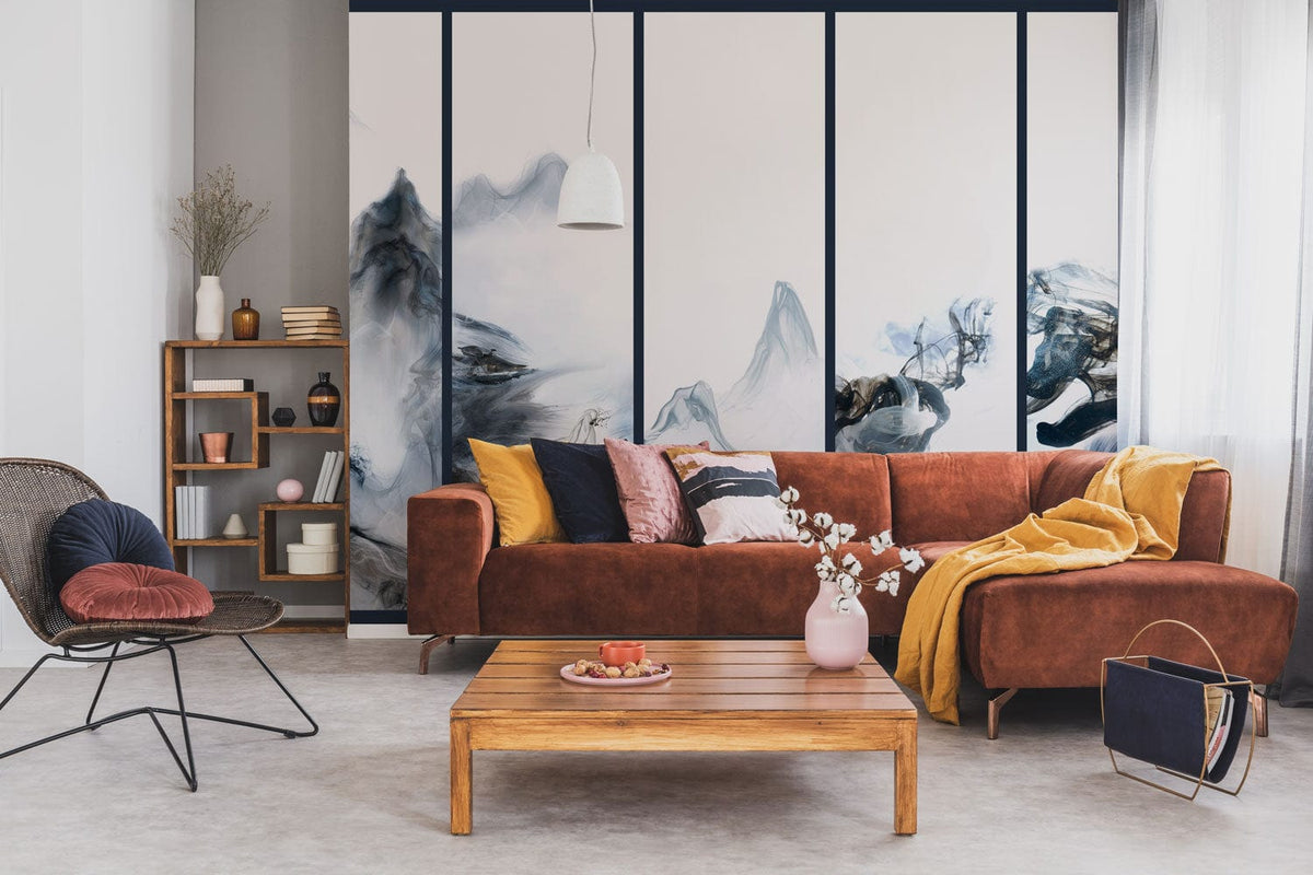 Oriental style mural with brown sofa, pendant light, shelving unit; serene blue mist mountain scene.