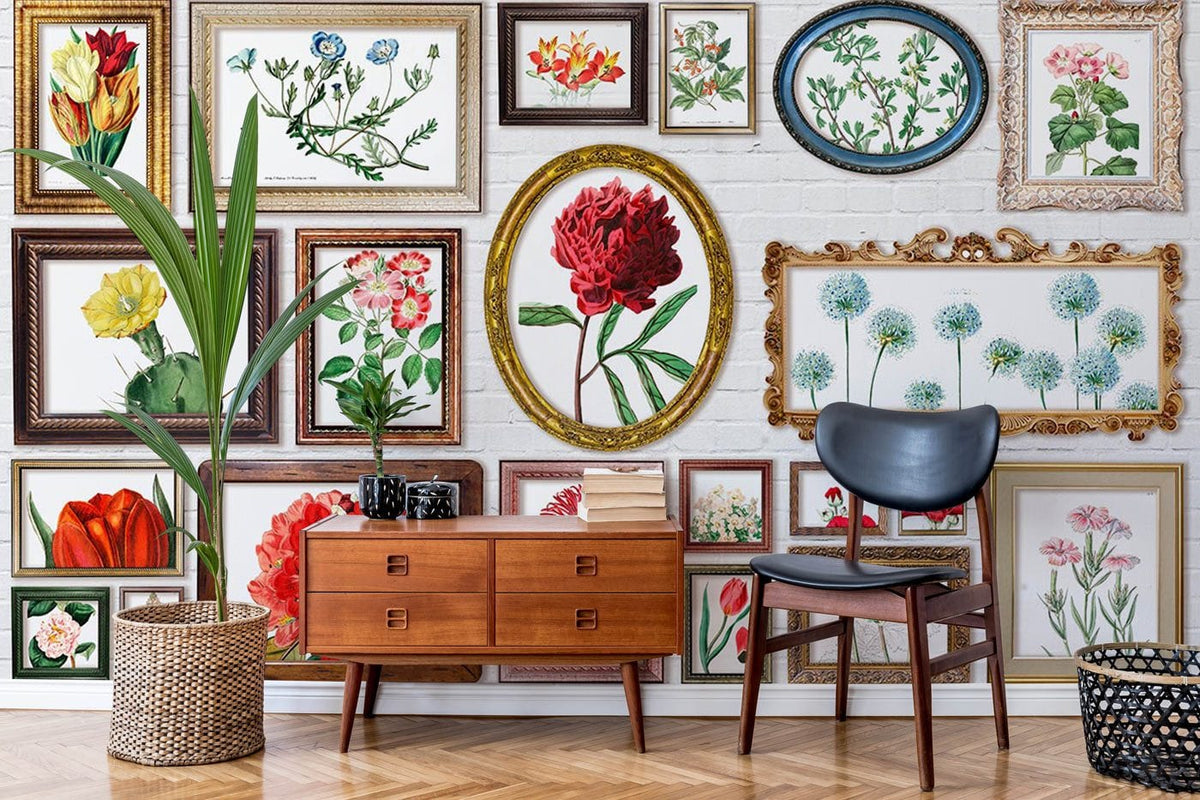 Vintage floral gallery mural wallpaper with framed botanical art, mid-century wooden cabinet, chevron flooring.