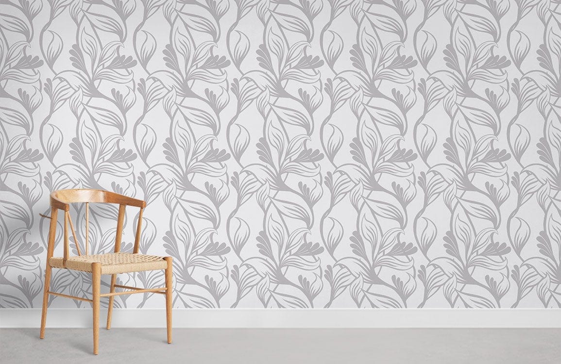 Elegant grey botanical leaf wallpaper in room with wooden chair and light grey flooring.