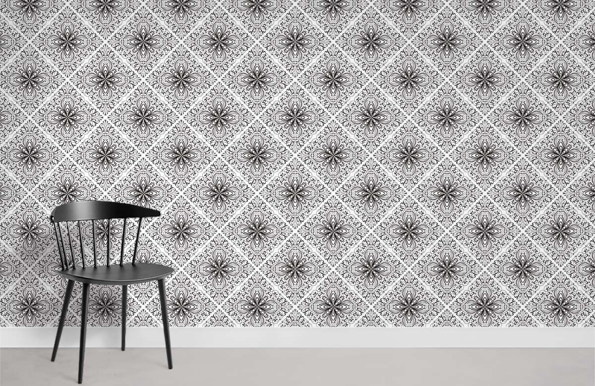 Vintage Victorian floral damask wallpaper in black and white, featuring elegant chair on grey flooring.